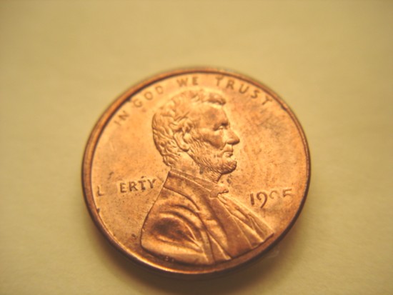 2000-Lincoln-Memorial-Cent-Stuck-Through-Cloth?